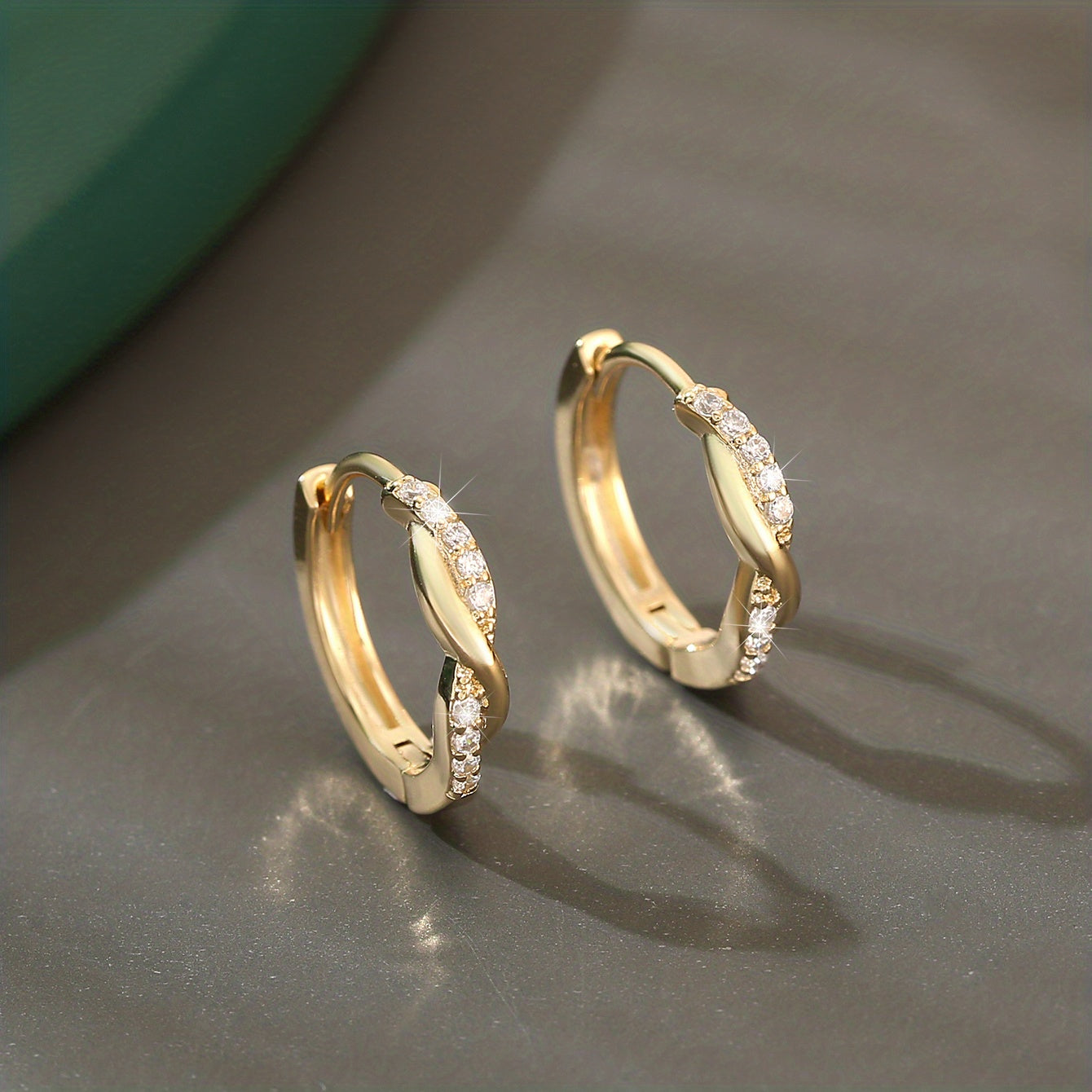 Lunarya | Women's elegant twisted earrings with zirconia | Golden yellow