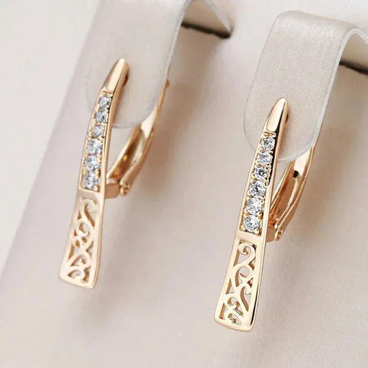 Small natural zirconia earrings in gold