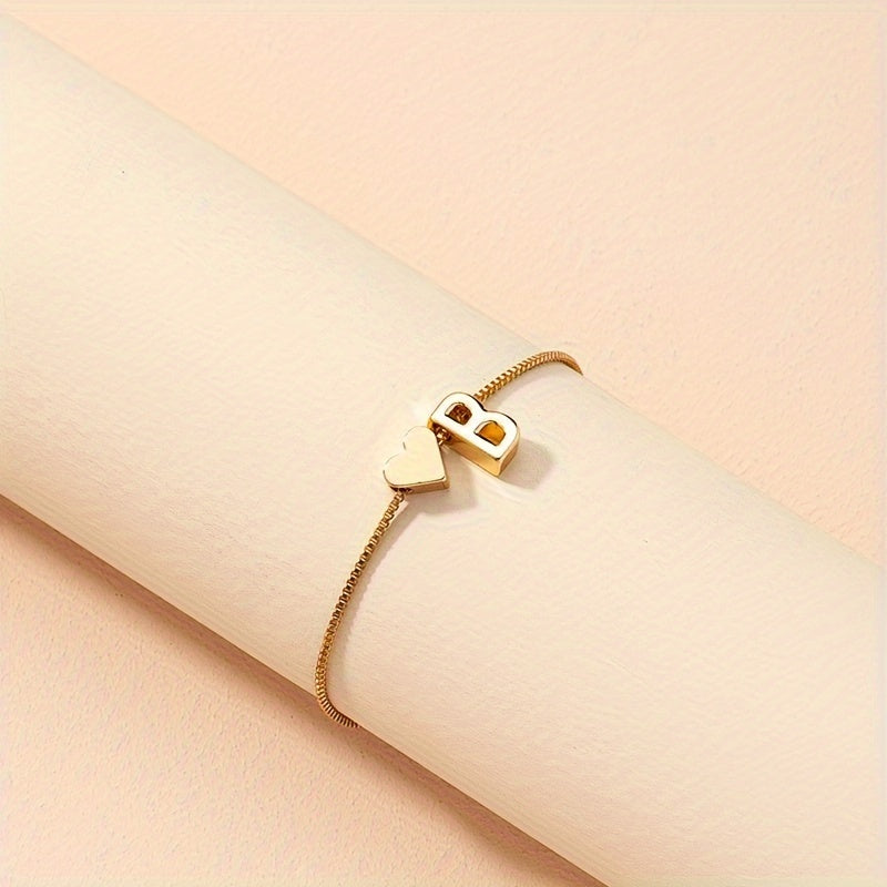 Liora | Women's minimalist heart bracelet with letter beads | Gold