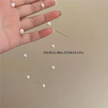 Lunelle | Women's minimalist pearl necklace with invisible thread | White