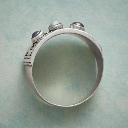 Geometric Ring with Carved Pearl and Three Stones