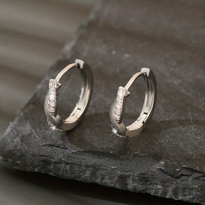 Lunarya | Women's elegant twisted earrings with zirconia | Golden yellow