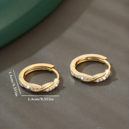 Lunarya | Women's elegant twisted earrings with zirconia | Golden yellow
