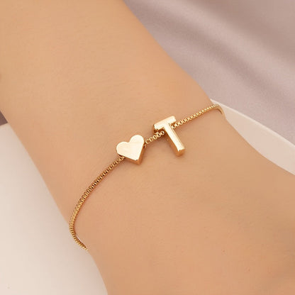Liora | Women's minimalist heart bracelet with letter beads | Gold