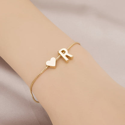Liora | Women's minimalist heart bracelet with letter beads | Gold