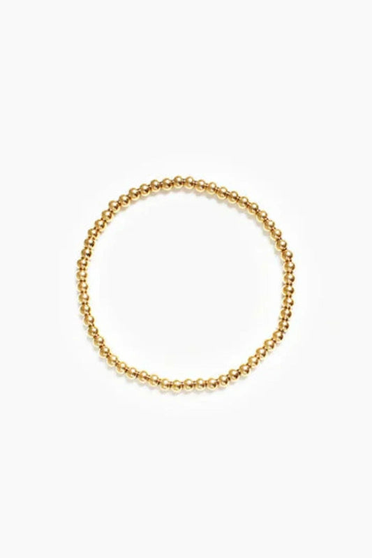 CrownLuxe armband – elegant gouden kralenontwerp met een koninklijke charme. Een verfijnd accessoire dat perfect is voor elke gelegenheid en een vleugje luxe toevoegt aan uw look