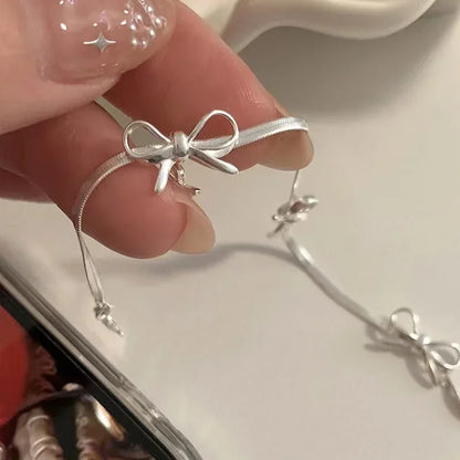 Miralyn | Women's bracelet with bow detail and elegant shine | Silver