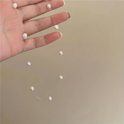 Lunelle | Women's minimalist pearl necklace with invisible thread | White